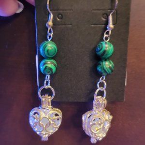 Earrings Hand crafted Heart with glow in the dark beads.